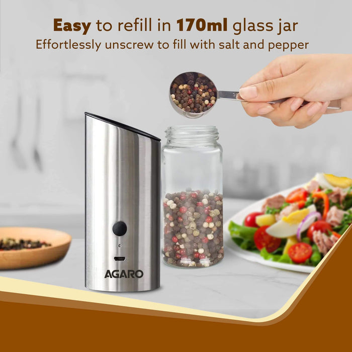 Agaro salt and pepper shaker set with a glass jar and metal container on a kitchen counter.