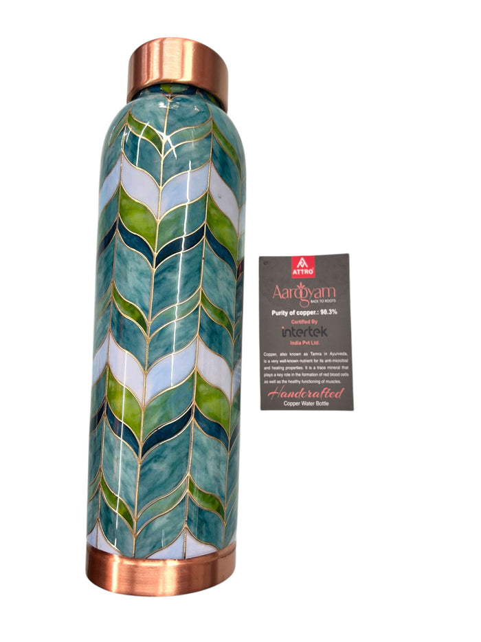 Ayurvedic copper water bottle with elegant green and teal leaf pattern