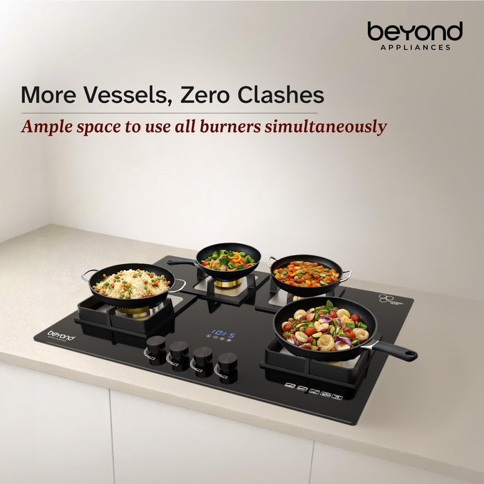 Beyond Dorado hobtop with four pans cooking simultaneously showing ample space between burners