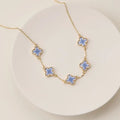 Blue Floral Clover Enamel Necklace – Gold Tone