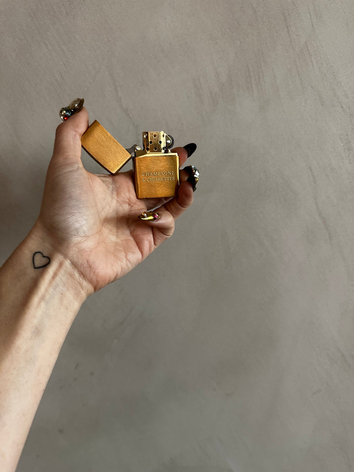 Champagne & Cigs Engraved Zippo Lighter – Brass | Feste