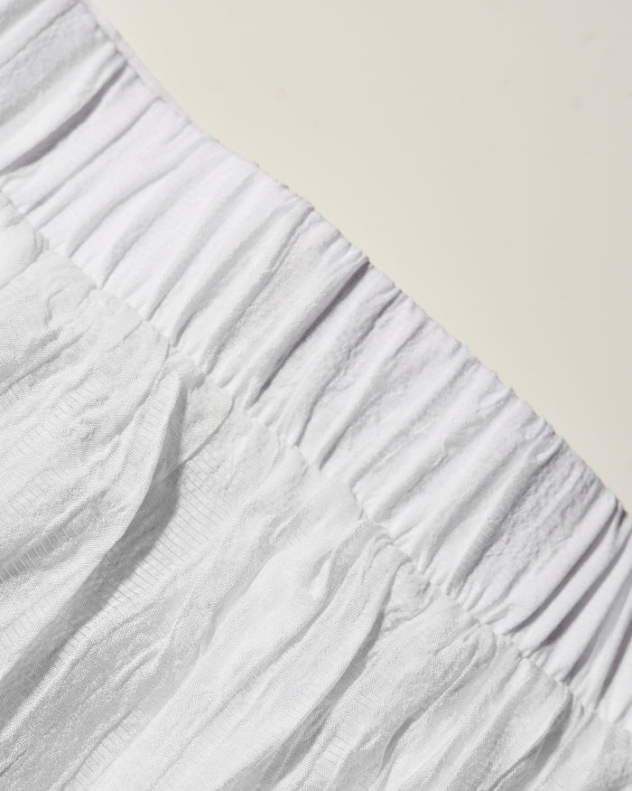 Close up shot of textured fabric of Flowy Pant - Gauze White