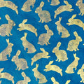 Giftwrap - Bunnies, gold on dark teal