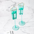 Gold Rimmed Turquoise Heart Champagne Flute Stemware