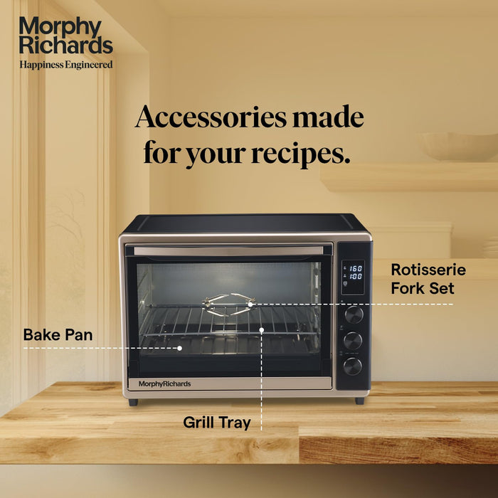 Morphy Richards 52L OTG with built-in dehydrate mode drying orange slices, showing dehydrate function icon and dried fruit chips