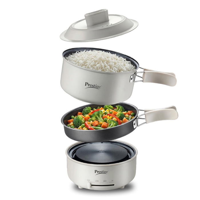 Prestige Electric Omnipot 1.3 litre electric cooking pot with fry pan and lid on a kitchen counter
