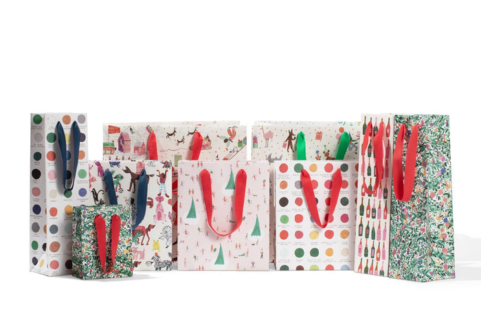 Right Hand on Red Gift Bag