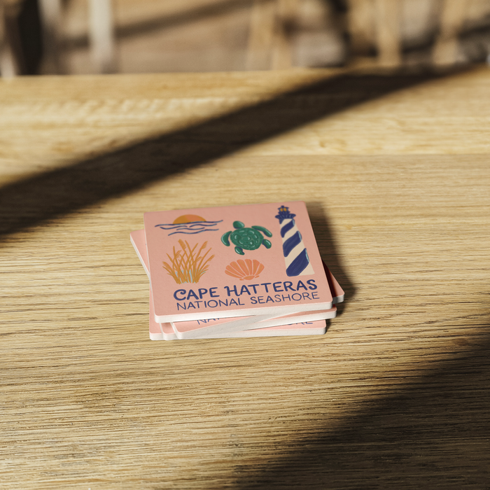 Stone_Coaster_-_Cape_Hatteras_NS_Landmar_SquareStoneCoaster_WoodTable_AS_Mockup.png_15452483