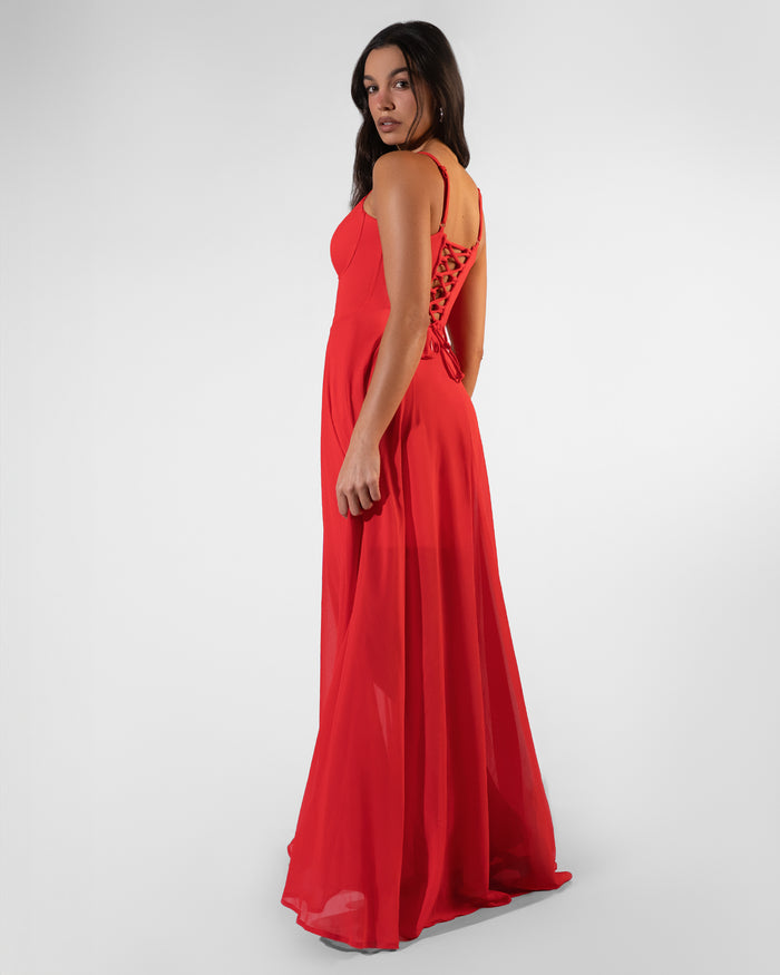 Back view of Vixen Corset Maxi Dress - Red on model
